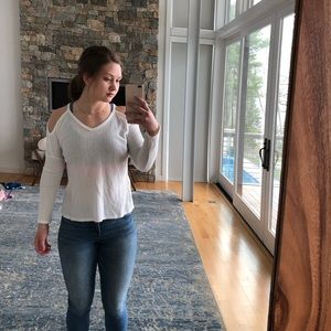 White open shoulder sweater.